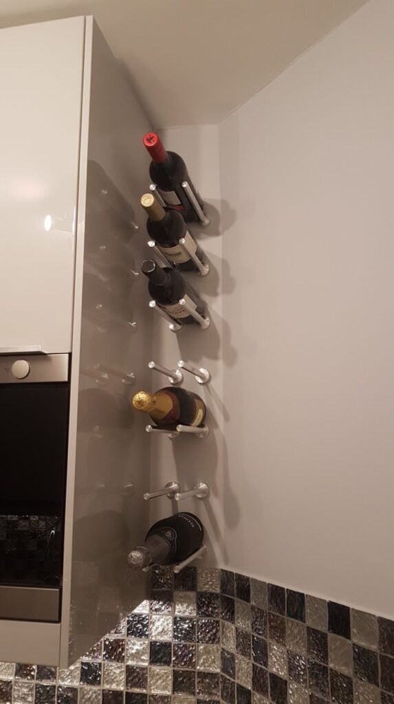 Vino Rails wall mounted metal wine rack peg system VintageView